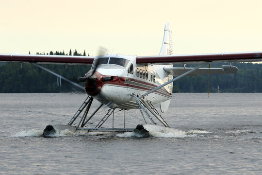Turbo-Otter Floatplane taxiing at Red Lake, Ontario at dawn