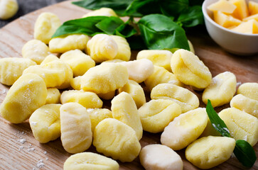 Gnocchi, Fresh Uncooked Potato Gnocchi on Wooden Board, Italian Cuisine