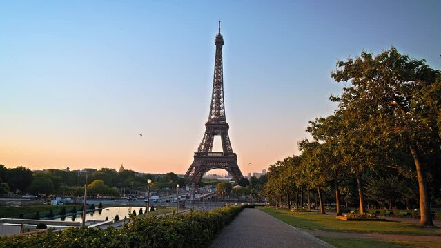 The romantic city of Paris at golden sunset. View of the historical Tower in Paris from the Trocadero Garden in France.