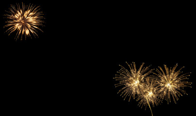 Fototapeta premium Party New Year design, Golden Shining Fireworks with golden stars. All light effects, stars isolated and grouped. Shining elements 2024. Holiday fireworks. golden Firework on black background Festive,