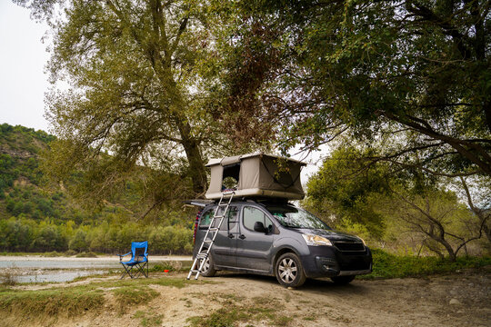 Van with rooftop tent