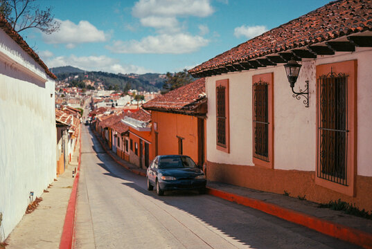 Vintage car on the street of local neighbourhood in Mexico 