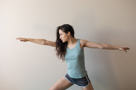 girl in the pose of a warrior