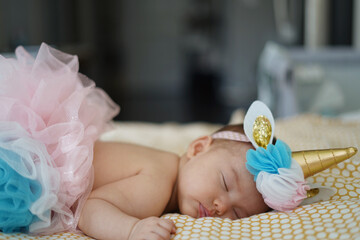 sleeping baby in dress