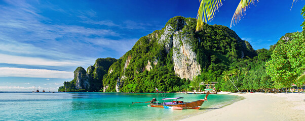 koh phi phi thailand with long tail boat on beach - obrazy, fototapety, plakaty