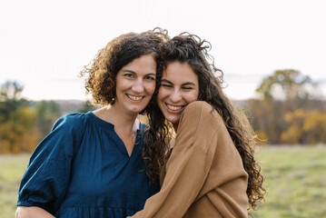 Portrait of a smiling mother and her daughter 