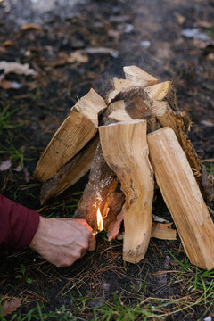 Wood lighting fire pit alfresco