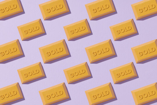 Seamless pattern with gold bar on pastel color