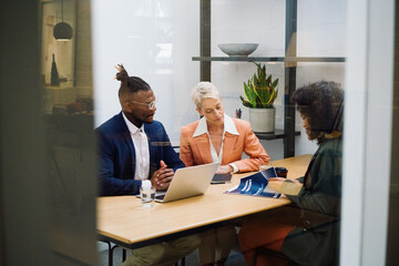 Business Meeting in a Shared Office Cubicle