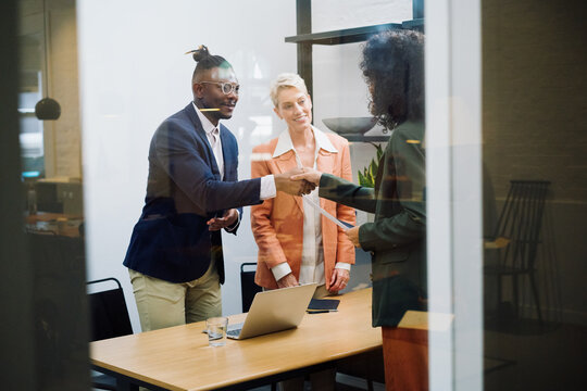Business Meeting in a Shared Office Cubicle