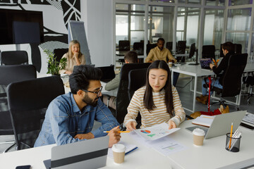 Office area. Diverse team. Colleague. Workspace. Calm atmosphere