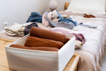  folder clothes at her bedroom 