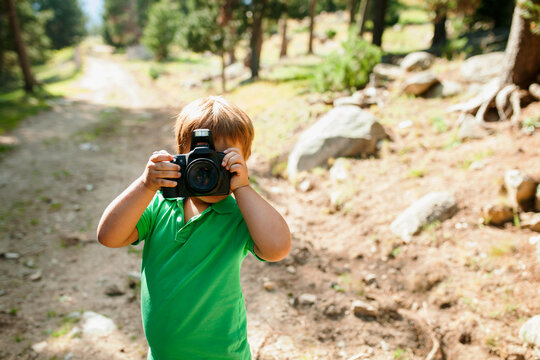 kid taking a picture