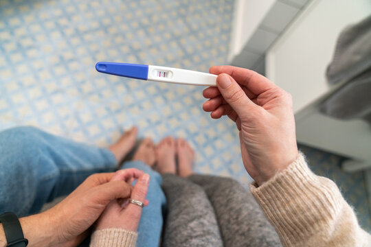 Woman Hand Holding Pregnancy Test