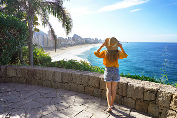 Holidays in Rio de Janeiro. Full length of beautiful fashion girl enjoying view of Rio de Janeiro...