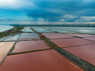 Salt farm excavator top view with salt hill