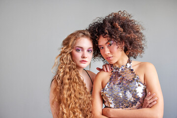 Calm women in chic outfits