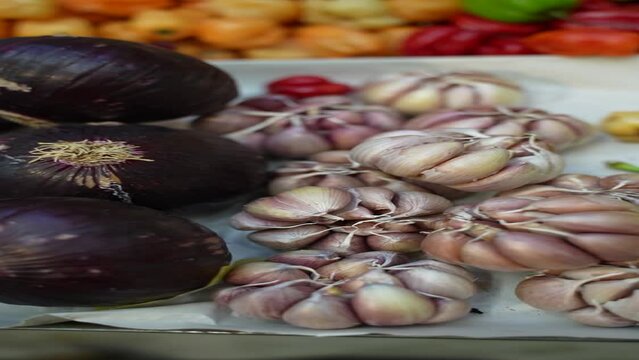 vegetables on a market video vertical reel onion garlic veggies
