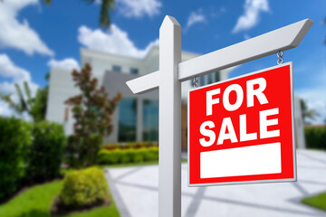 Home For Sale Real Estate Sign and Beautiful New House.