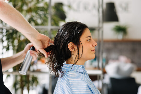 Hairdresser Cutting Hair 
