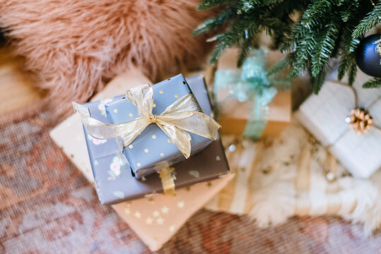 Pile of presents under Christmas tree