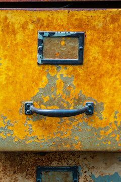 Rusty, colorful filing cabinet
