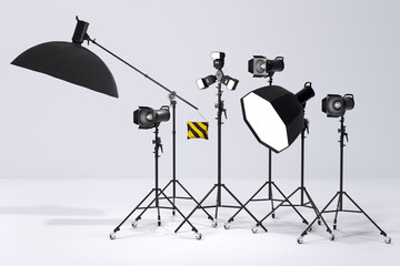 Photography studio flash on a lighting stand on white background - obrazy, fototapety, plakaty
