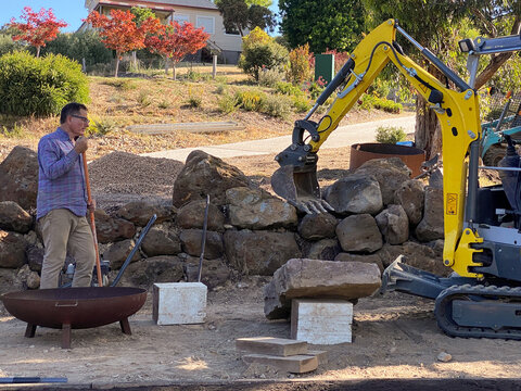Landscape Architect supervising rock placement 