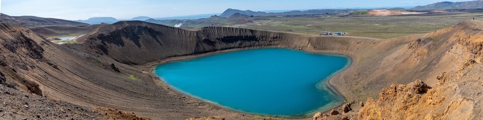 Panoramic image of green Askja volcano crater lake in Iceland