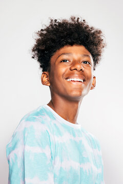 Cheerful black kid looking at camera
