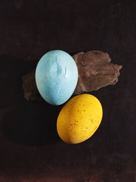 Painted blue and yellow Easter eggs