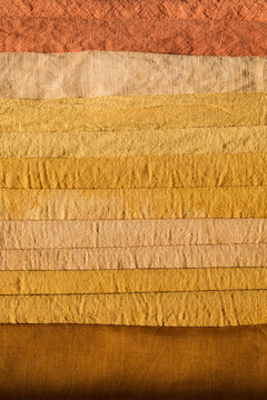 Warm textures of fabrics dyed with natural dyes
