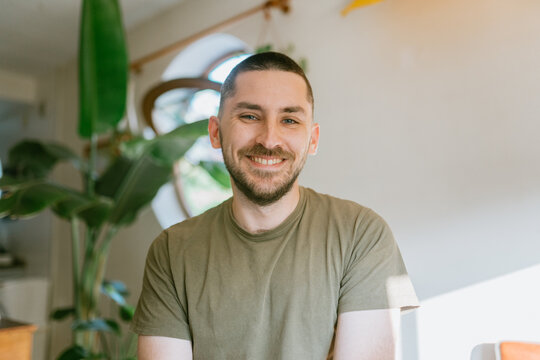 Man with fresh buzz cut at home