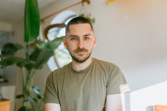 Serious man after buzz cut