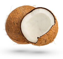 Two coconuts on a white isolated background. A whole coconut and half a coconut cast a shadow close-up. High quality photo. Isolate of coconuts of various shapes.