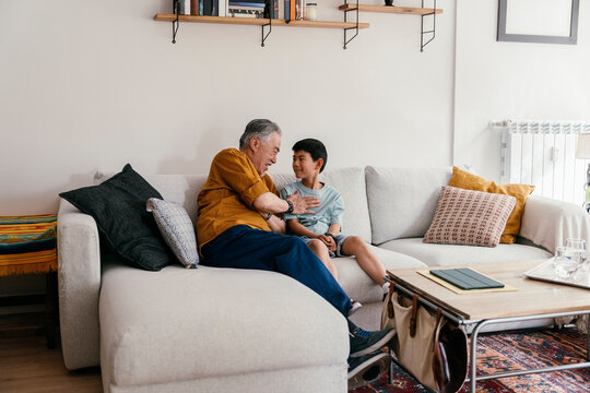 Grandfather and grandson bonding, creating memories.