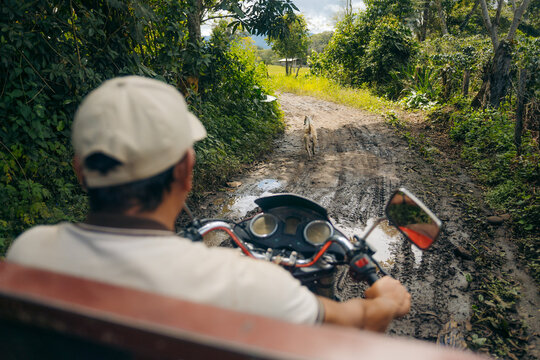 Man driving cargo motorcycle