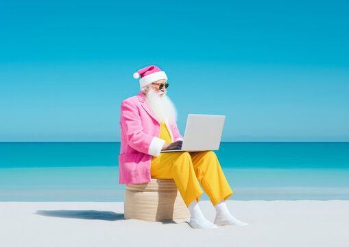 Elegantly and casually dressed Santa Claus as a digital nomad works on his laptop and enjoys the sunny beach. Generative AI.