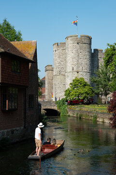 Chartham gardens  Canterbury Kent . with tourist on a  romantic boat ride in the canal of the river stour.