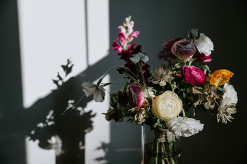 Bouquet of flowers in a pocket of light