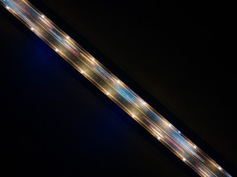 Top down aerial view of traffic on freeway interchange 