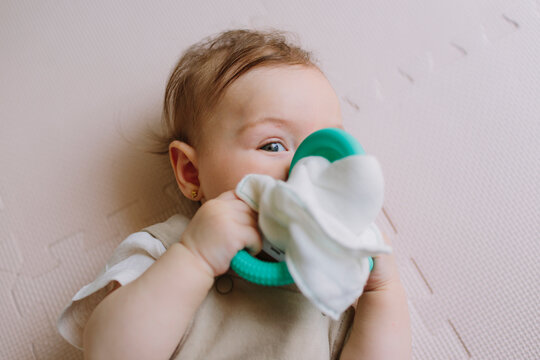 Baby playing with her mouth