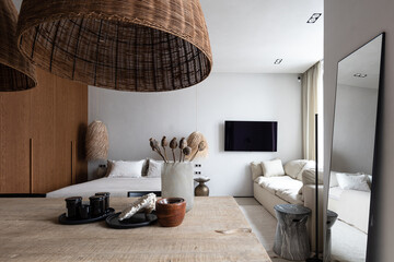 Big studio, natural materials, wood table mirror television wardrobe 