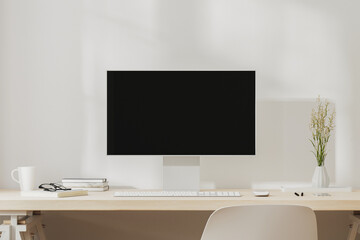 Workplace desk with computer screen, coffee mug and books, 3d render