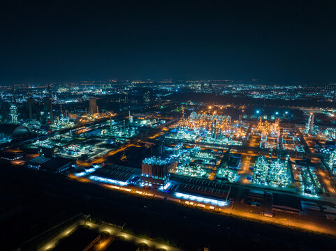 Aerial view oil and gas tank with oil refinery background 
