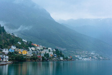 Scenic view of colourful Odda town near the fjord 