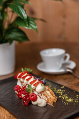 Sweet dessert in a restaurant. Wooden background