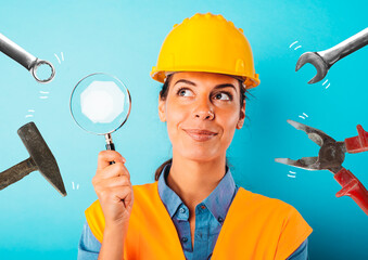 Happy woman worker with helmet and magnifier