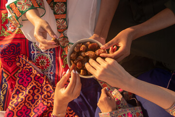 Friends Breaking Fast Together with Dates