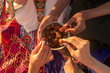 Friends Breaking Fast Together with Dates